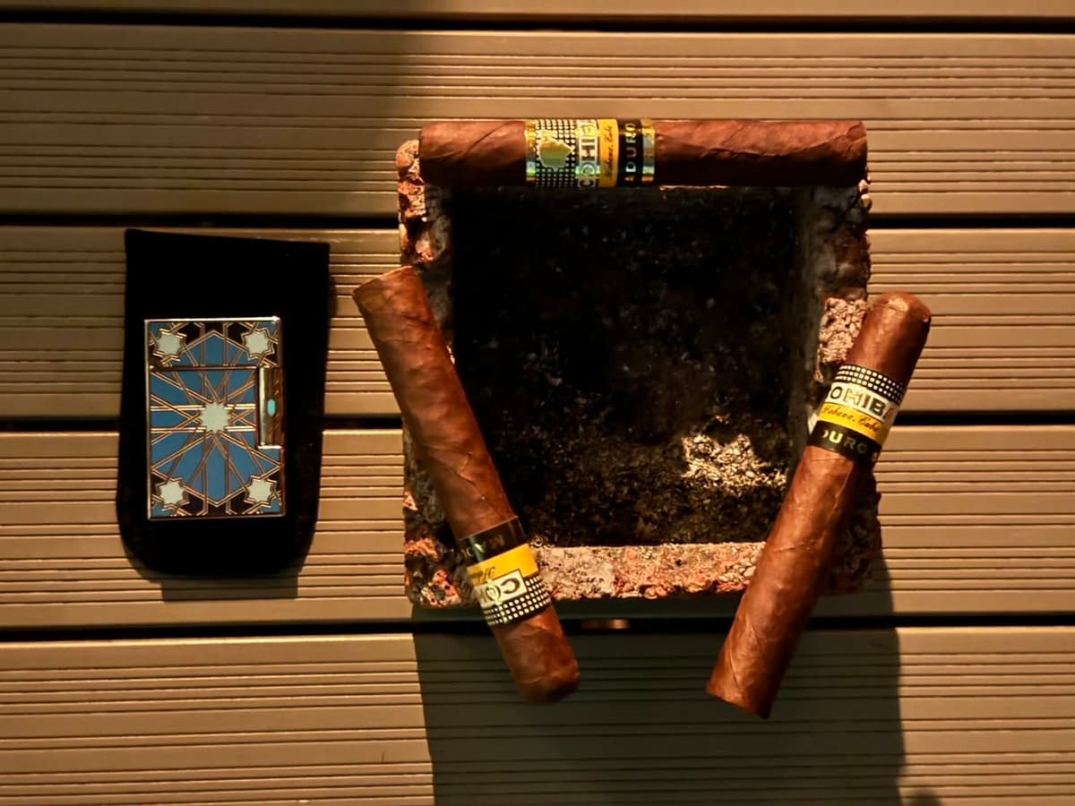 Neil Smoking Cigar Bench